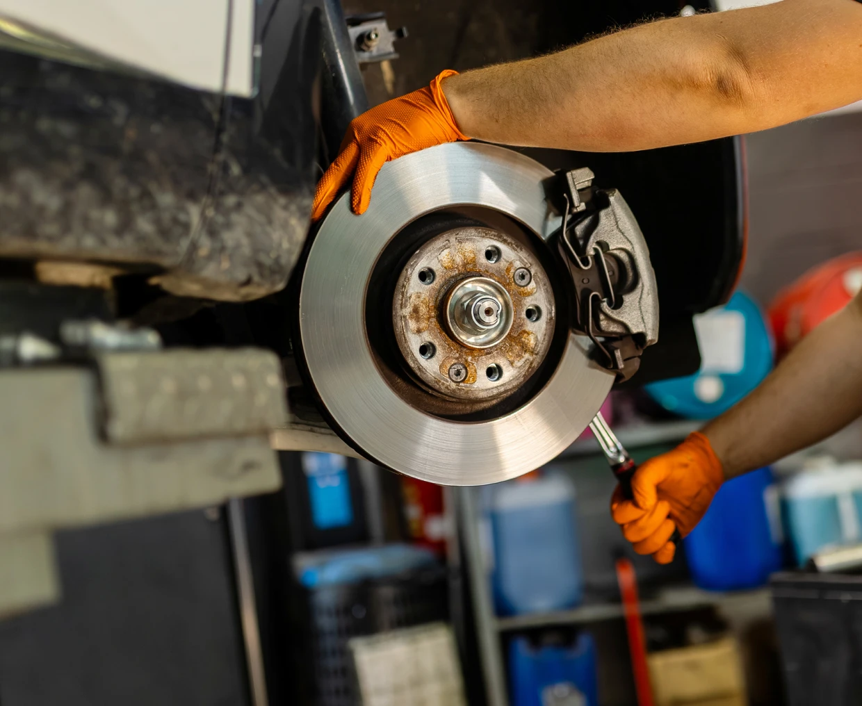 Car brake repair in progress